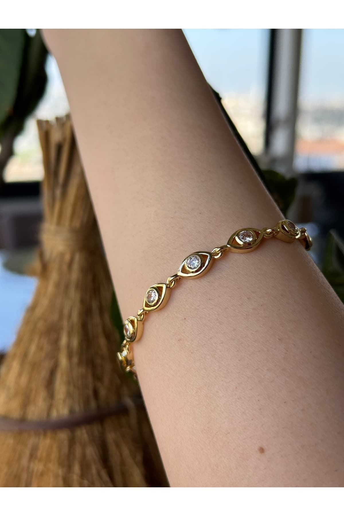 Paslanmaz çelik zirkon taşlı göz figürlü suyolu Gold Bileklik